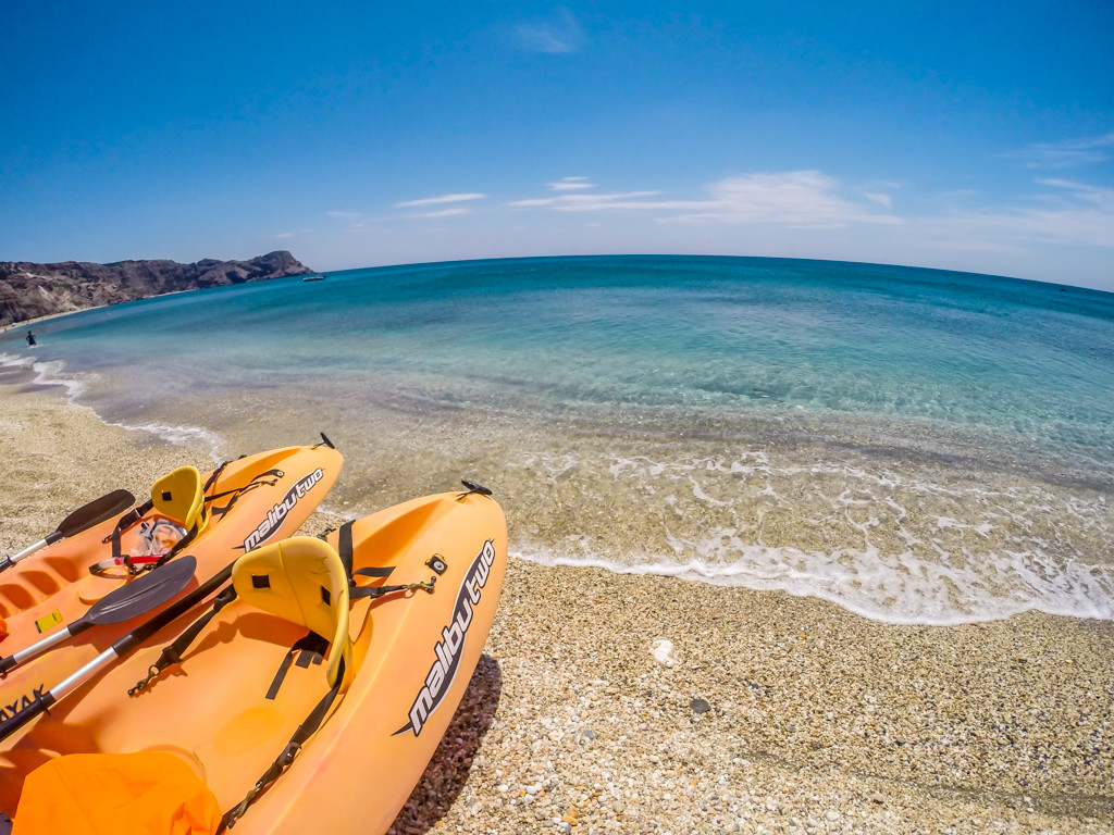 Sea kayaking on the island of Milos, Greece