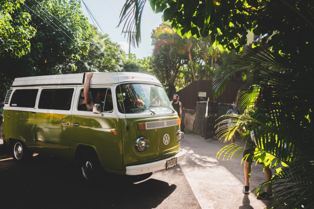 Volkswagen van in a tropical setting